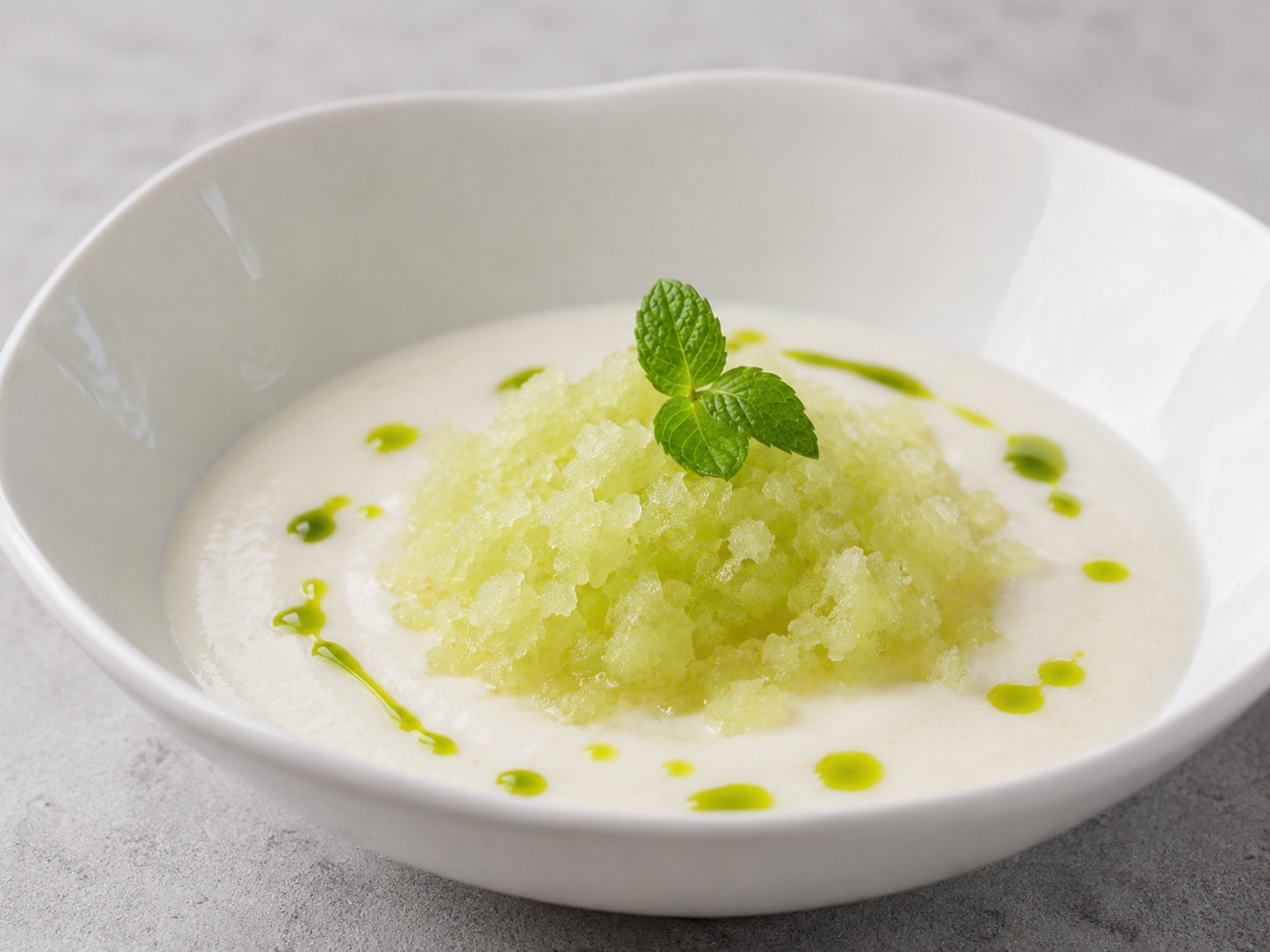 AJO BLANCO CON GRANIZADO DE MELÓN Y ACEITE DE HIERBABUENA
